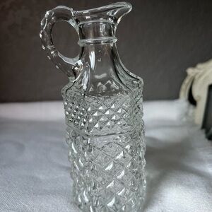 vintage Anchor Hocking Wexford glass cruet, often used for oil or vinegar.